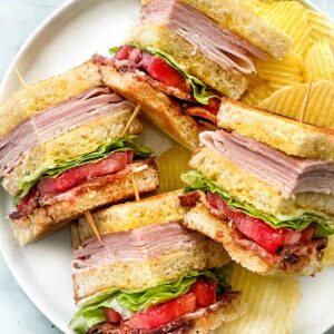 Sandwiches with chips on plate
