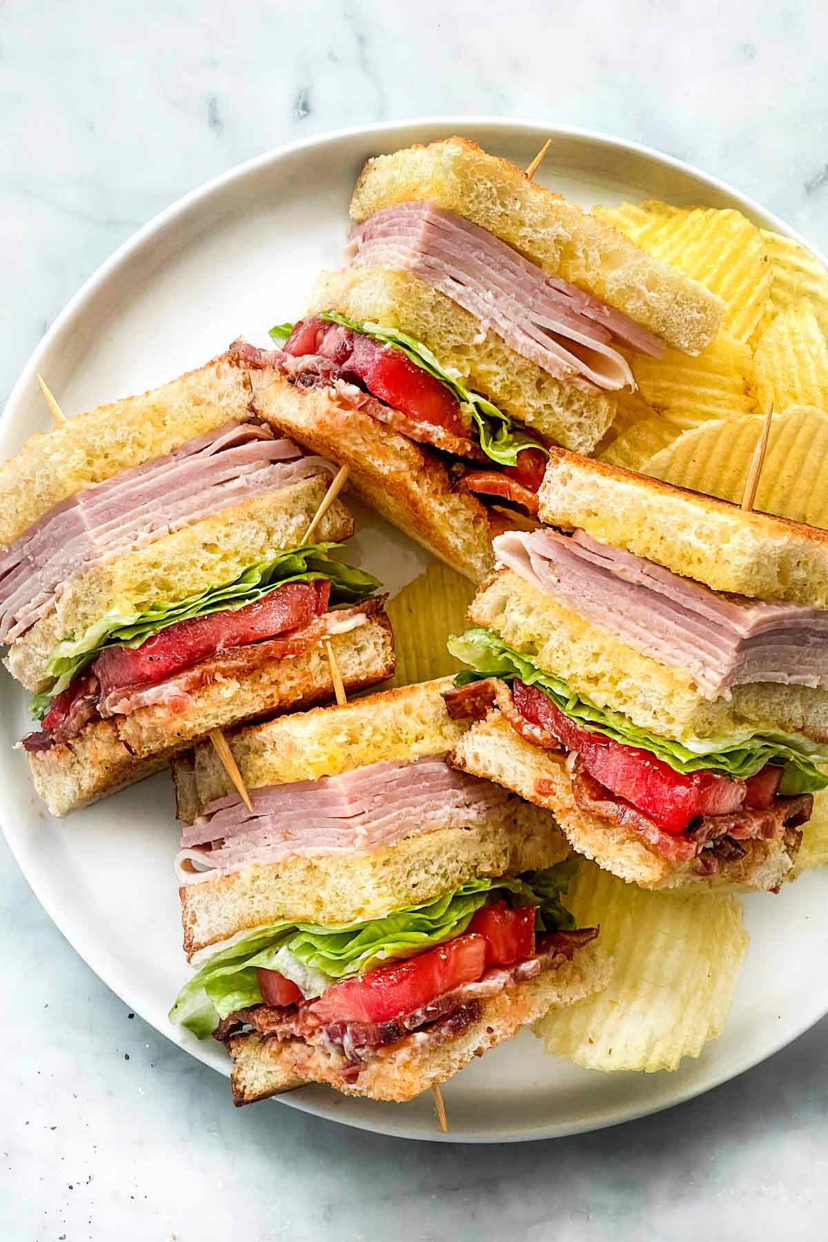 Sandwiches with chips on plate