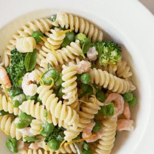 Shrimp pasta with broccoli and peas