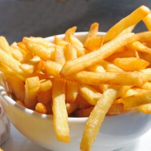 Crispy french fries in bowl