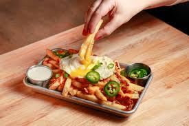 Loaded fries with egg
